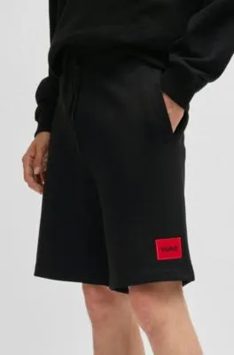 Shorts de felpa de algodón con etiqueta con logo roja